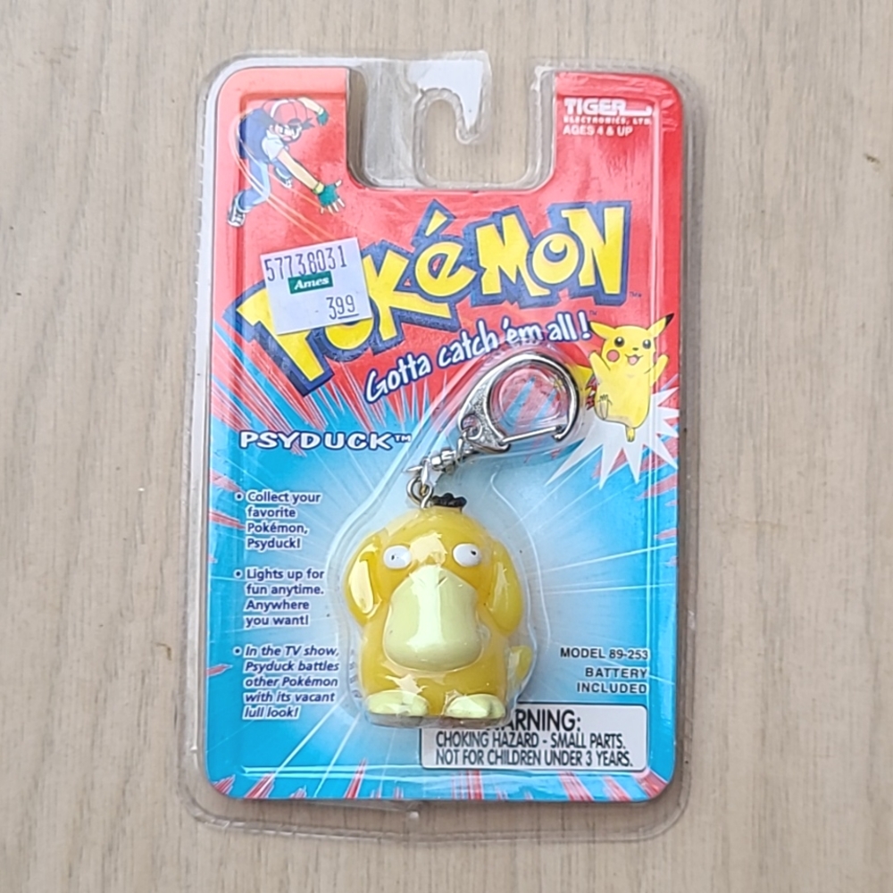Vintage Pokemon Light Up Psyduck Key-chain like new in original packagingYellow